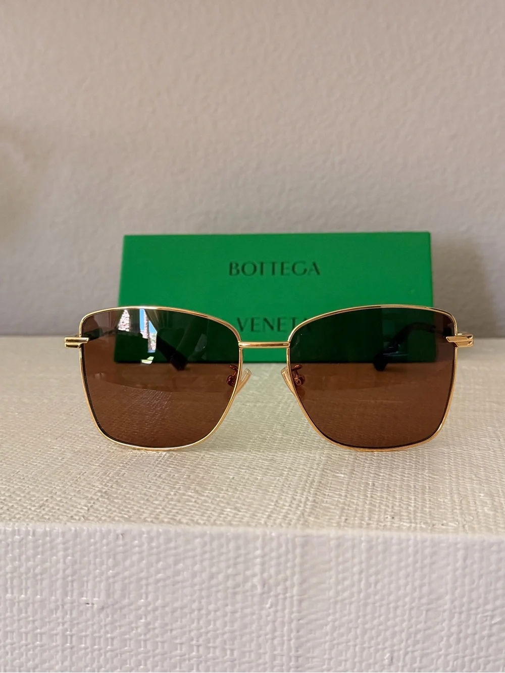 Bottega Veneta Gold Frame Sunglasses with Brown Lenses